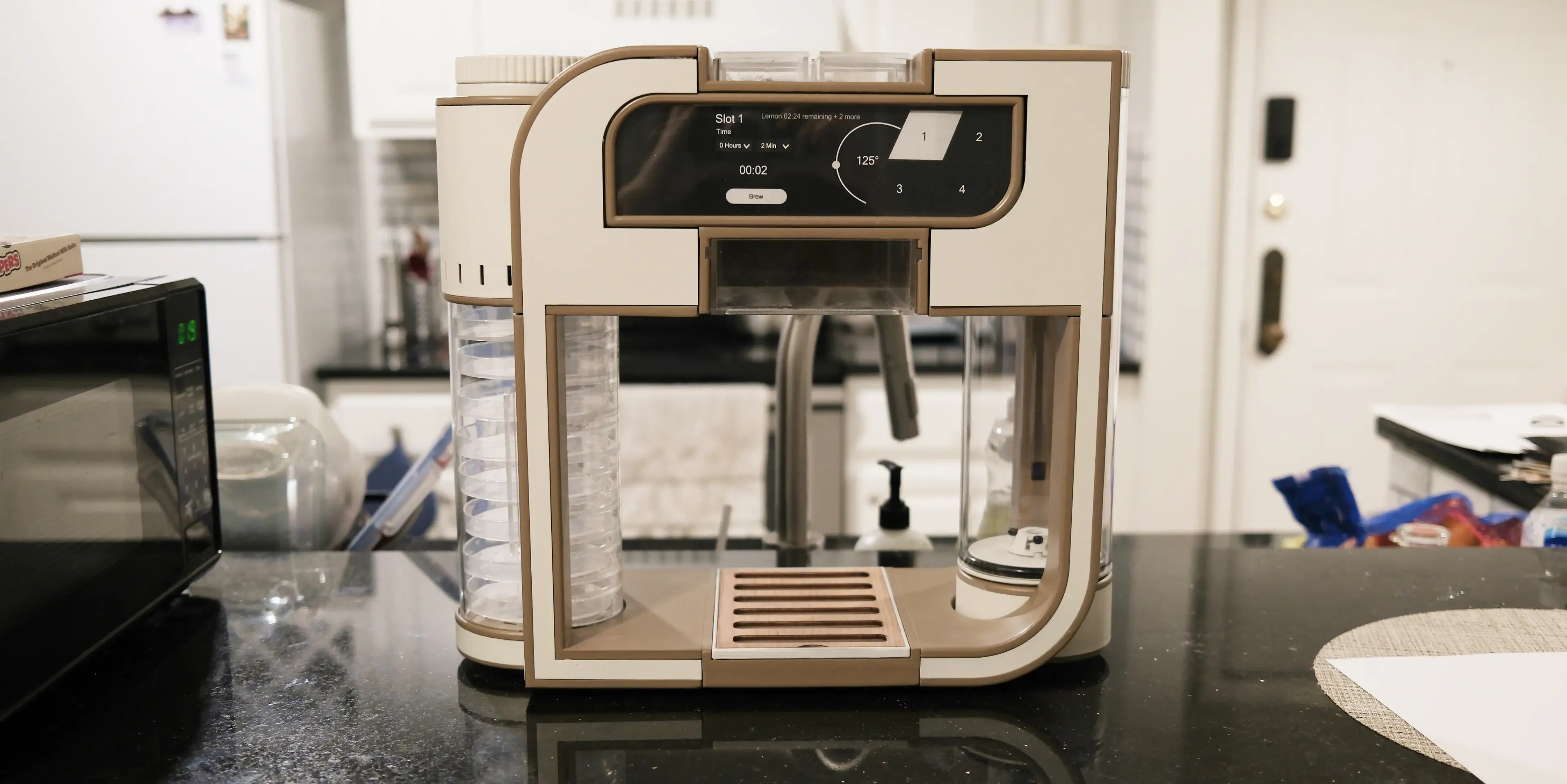 Hero image of the Infinitea product on a granite kitchentop.